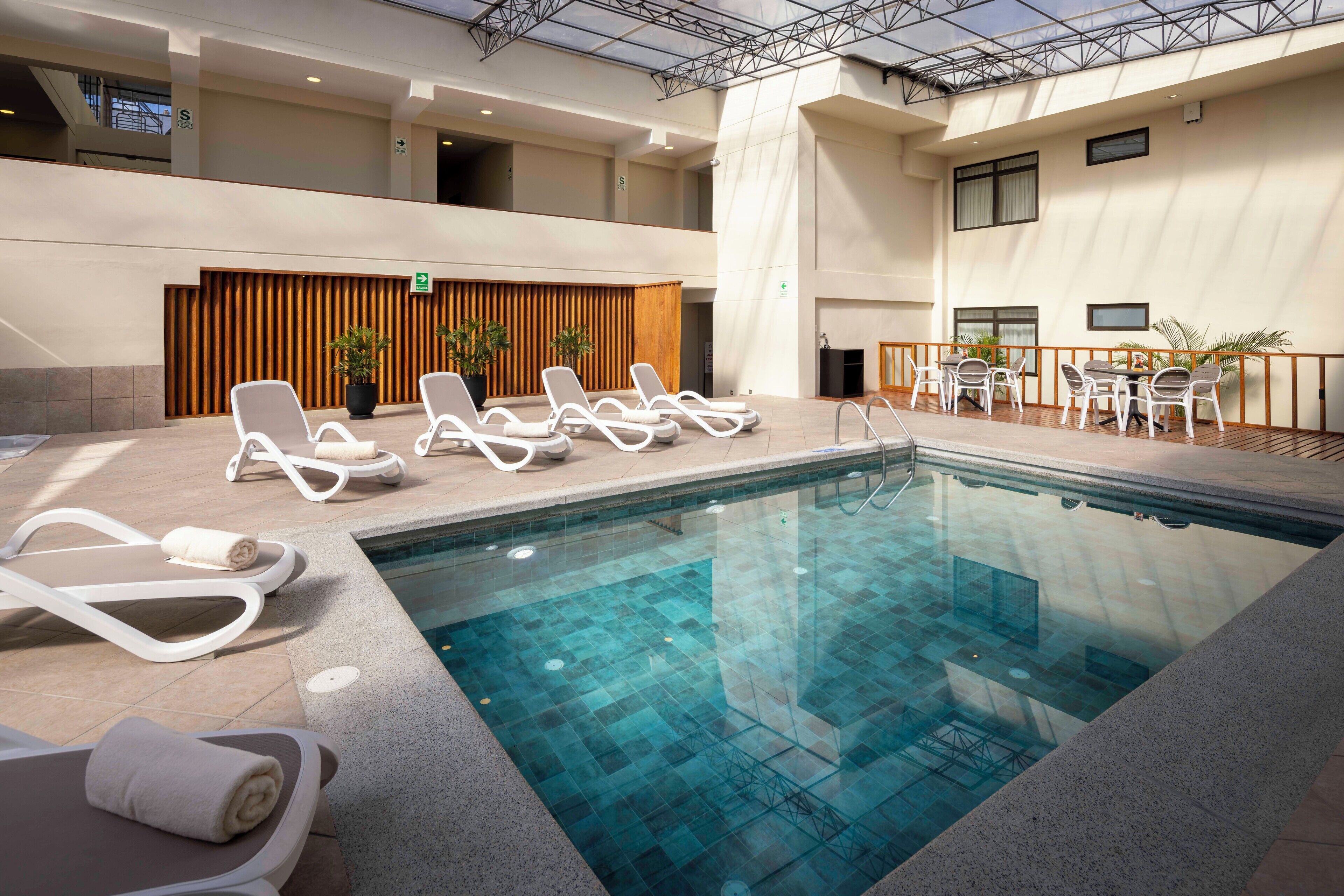 Indoor pool, open 9:00 AM to 6:00 PM, sun loungers