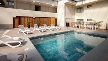 Indoor pool, open 9:00 AM to 6:00 PM, sun loungers