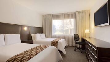 Ropa de cama de alta calidad y minibar