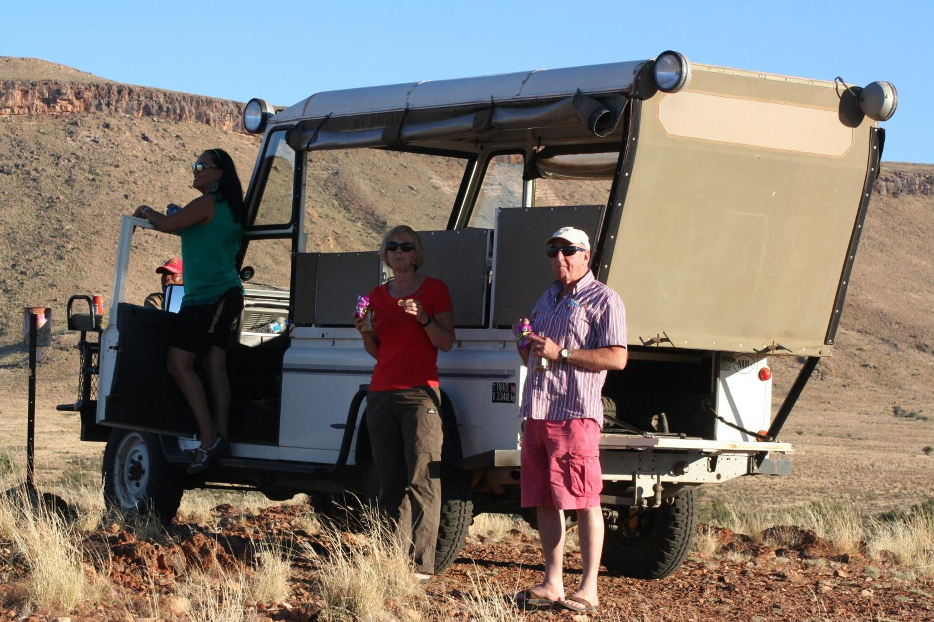 A vehicle with a large open cargo area, suitable for transporting equipment or supplies.