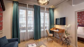 Family Suite | Living area | 81-cm LCD TV with satellite channels, TV