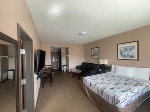 Premium bedding, Tempur-Pedic beds, desk, laptop workspace - Bell's Extended Stay and Suites (St. Robert)