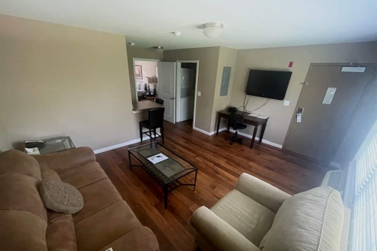 Premium bedding, Tempur-Pedic beds, desk, laptop workspace