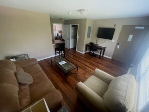 Premium bedding, Tempur-Pedic beds, desk, laptop workspace - Bell's Extended Stay and Suites (St. Robert)