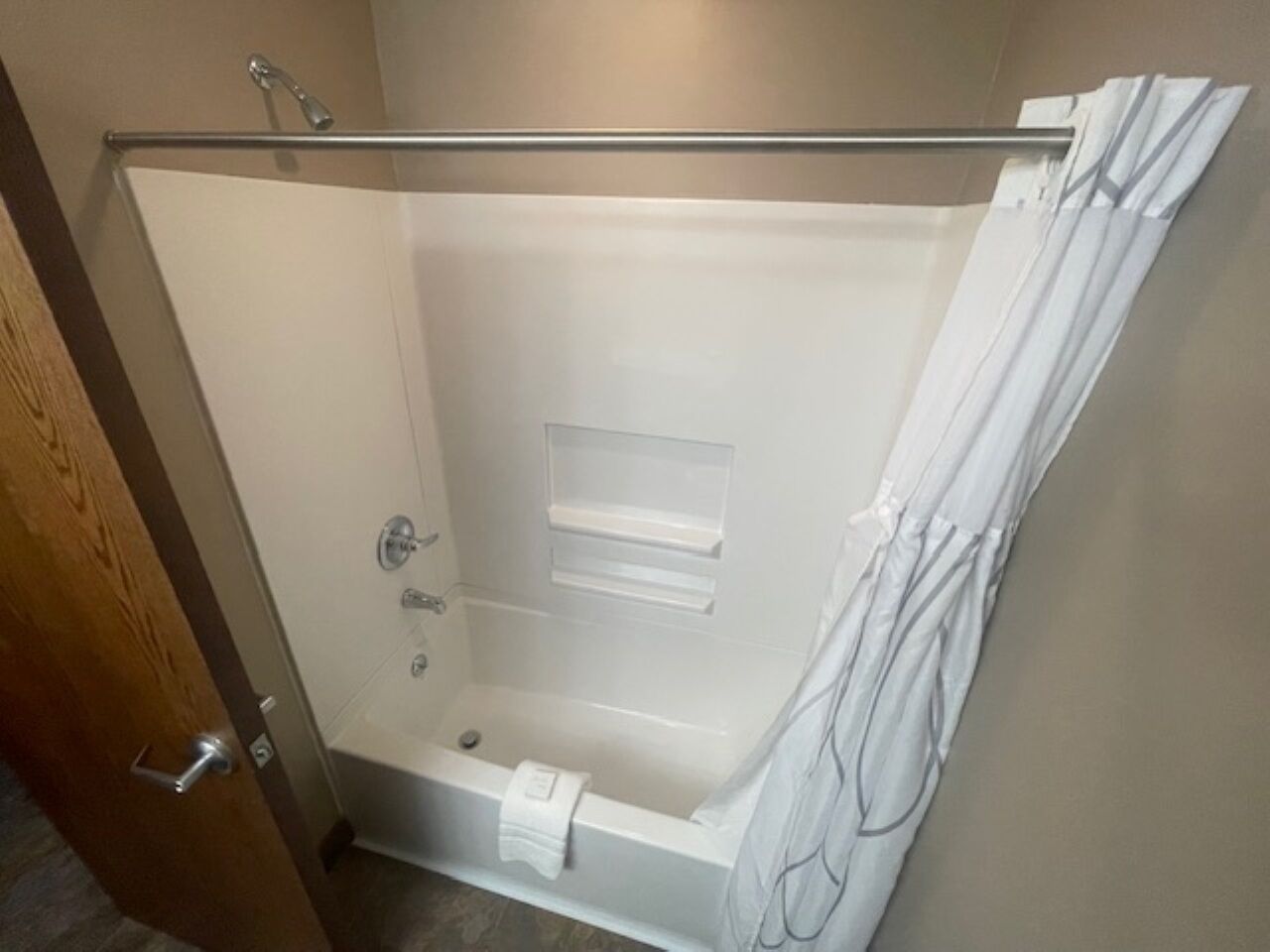 combined shower/bathtub, free toiletries, hair dryer, towels