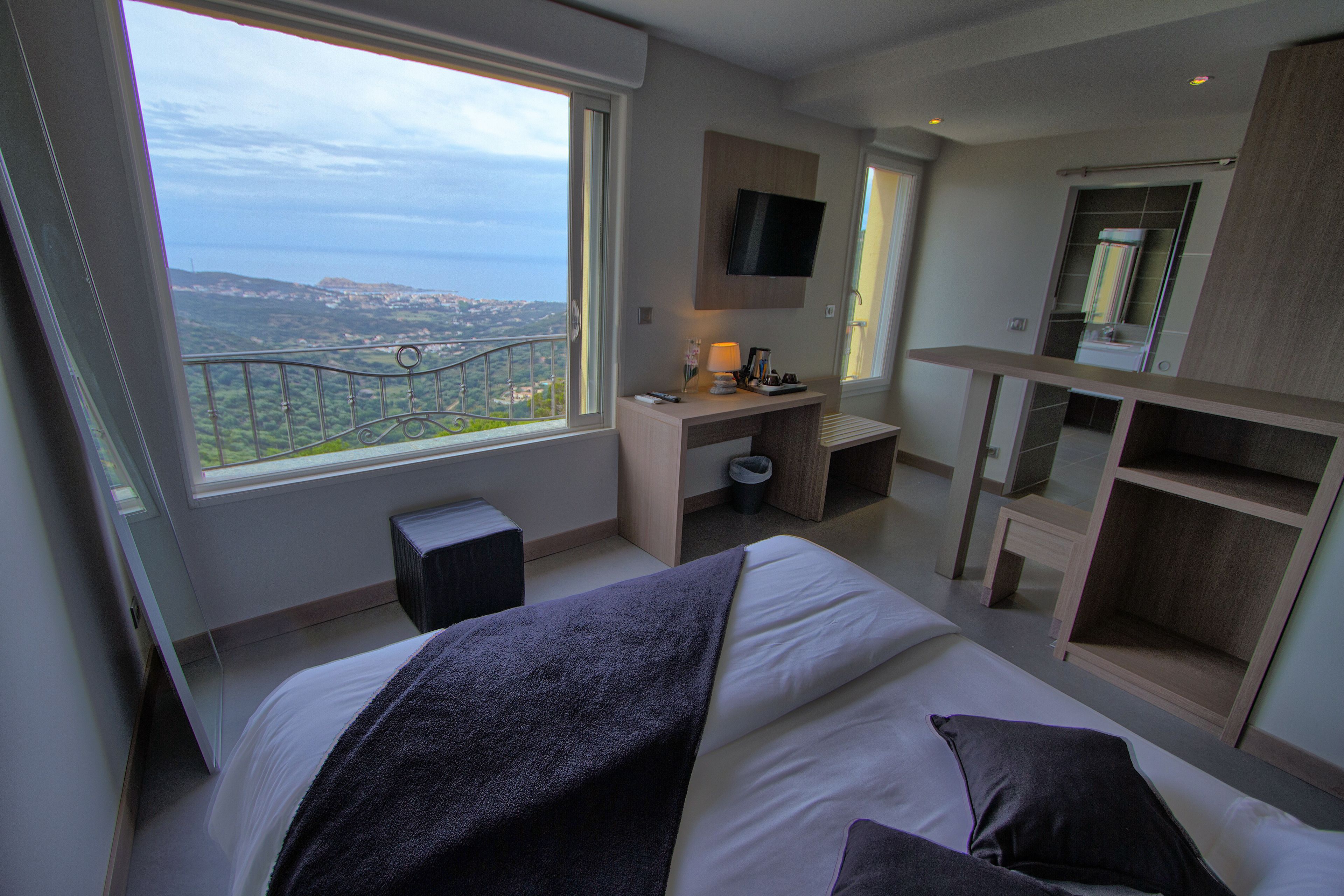 Chambre Double Exclusive, baignoire à jets, vue mer | Literie de qualité supérieure, bureau, chambres insonorisées