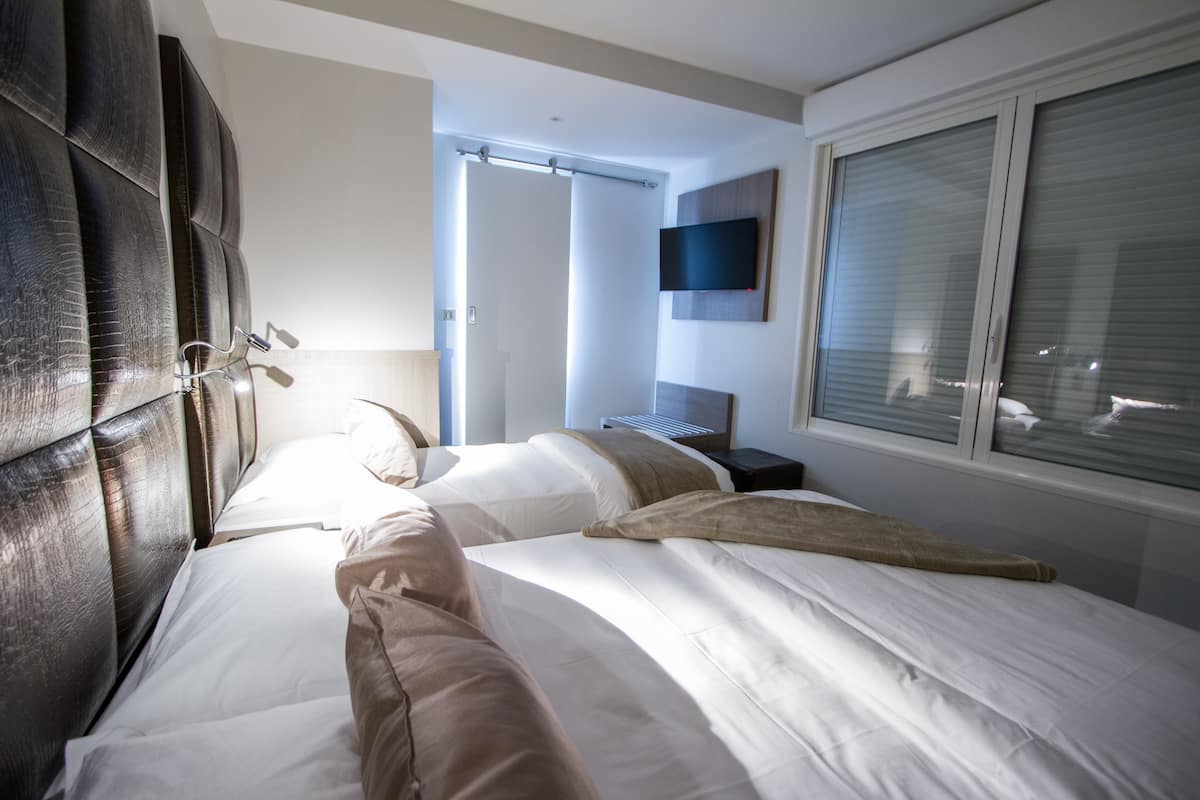 superior triple room, sea view | premium bedding, desk, soundproofing, iron/ironing board