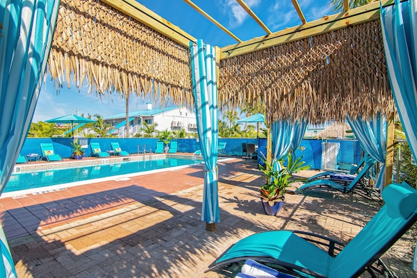 Outdoor pool, open 7:30 AM to 9:30 PM, free cabanas, sun loungers