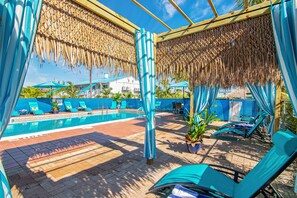 Outdoor pool, open 7:30 AM to 9:30 PM, free pool cabanas, pool loungers