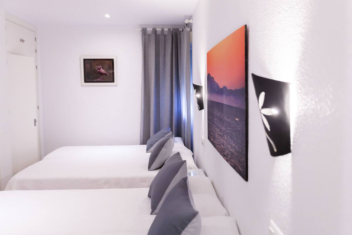 Quadruple Room, Private Bathroom | Desk, iron/ironing board (on request), free WiFi, bed sheets