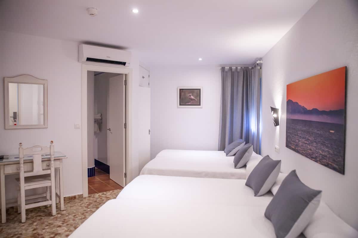 Quadruple Room, Private Bathroom | Desk, iron/ironing board, free WiFi, bed sheets