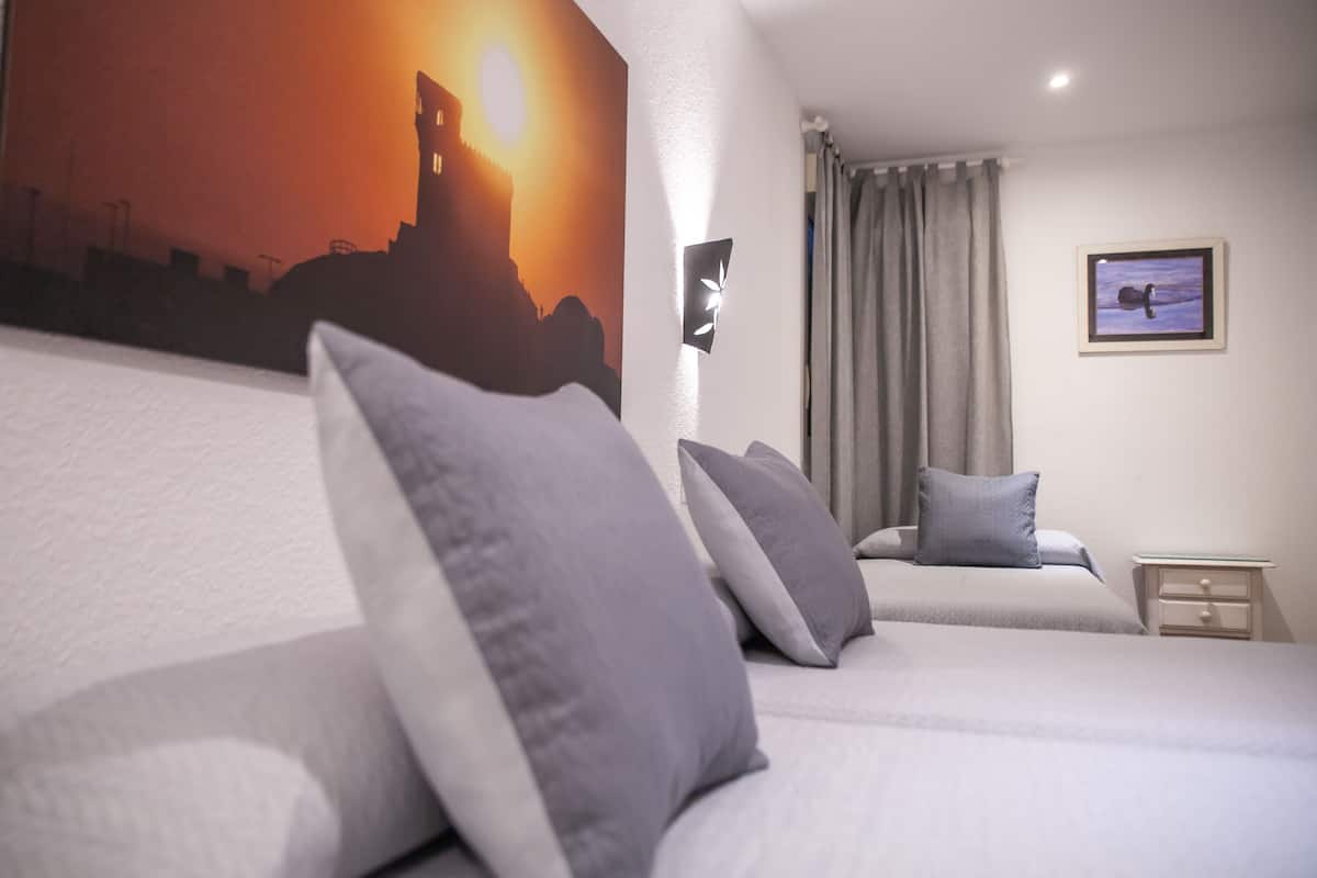 Standard Triple Room, Private Bathroom | Desk, iron/ironing board (on request), free WiFi, bed sheets