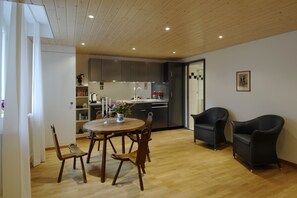 Standard Apartment, City View | Living room | TV, DVD player