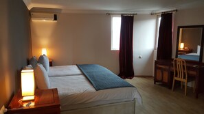 Chambre familiale | 1 chambre, minibar, décor unique, ameublement unique