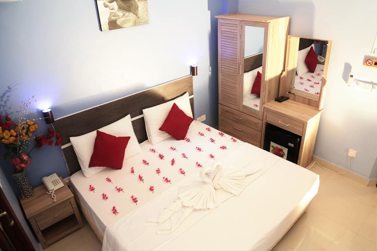 Family Room, 2 Bedrooms | Pillow-top beds, minibar, in-room safe, desk