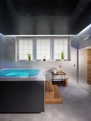 Een sauna, een bubbelbad, warm/mineraalwaterbronnen