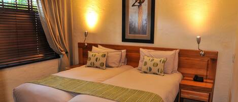 Premium bedding, down duvets, pillow-top beds, in-room safe