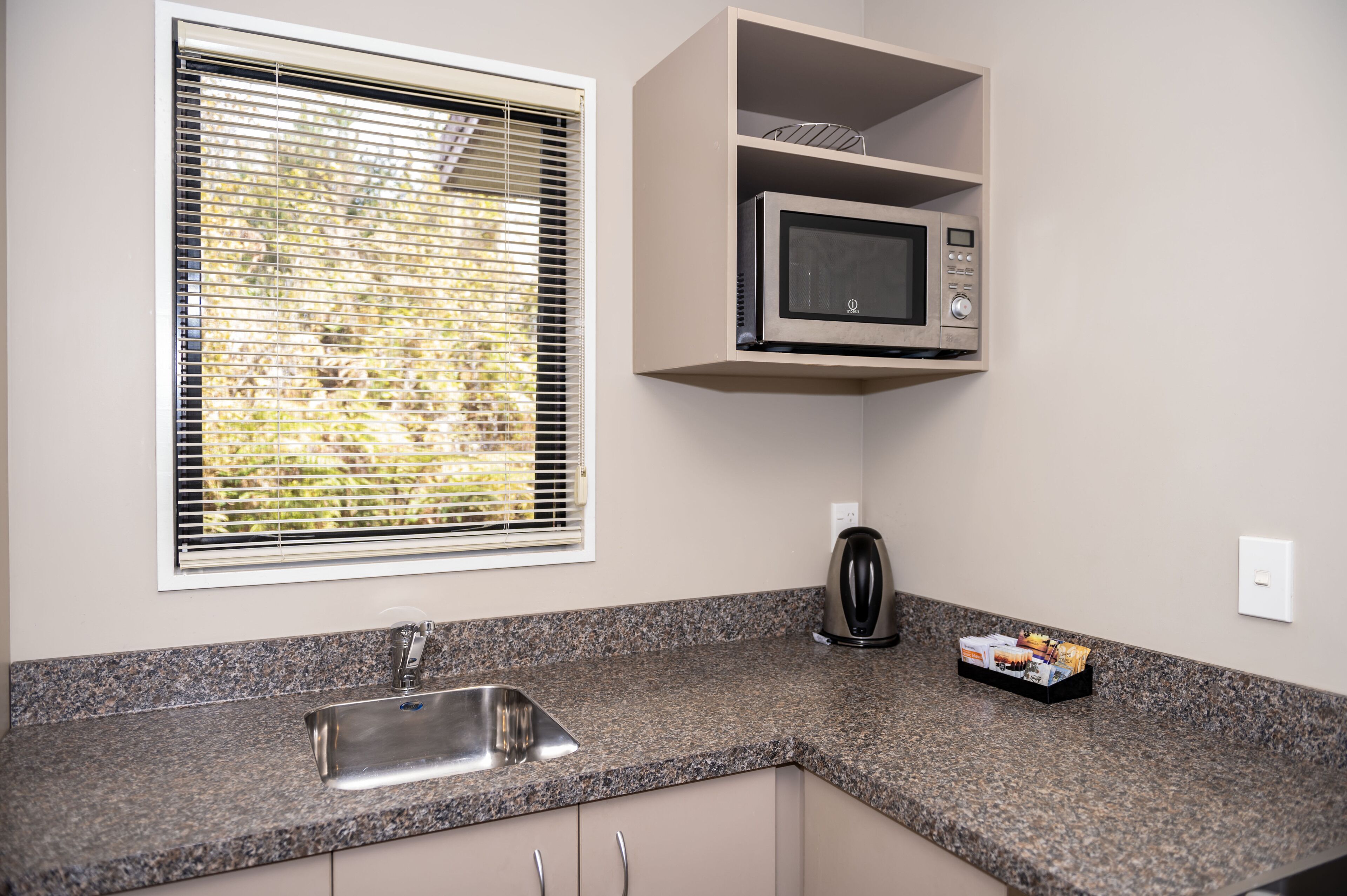 Apartment, 2 Bedrooms | Private kitchenette | Mini-fridge, microwave, electric kettle, toaster