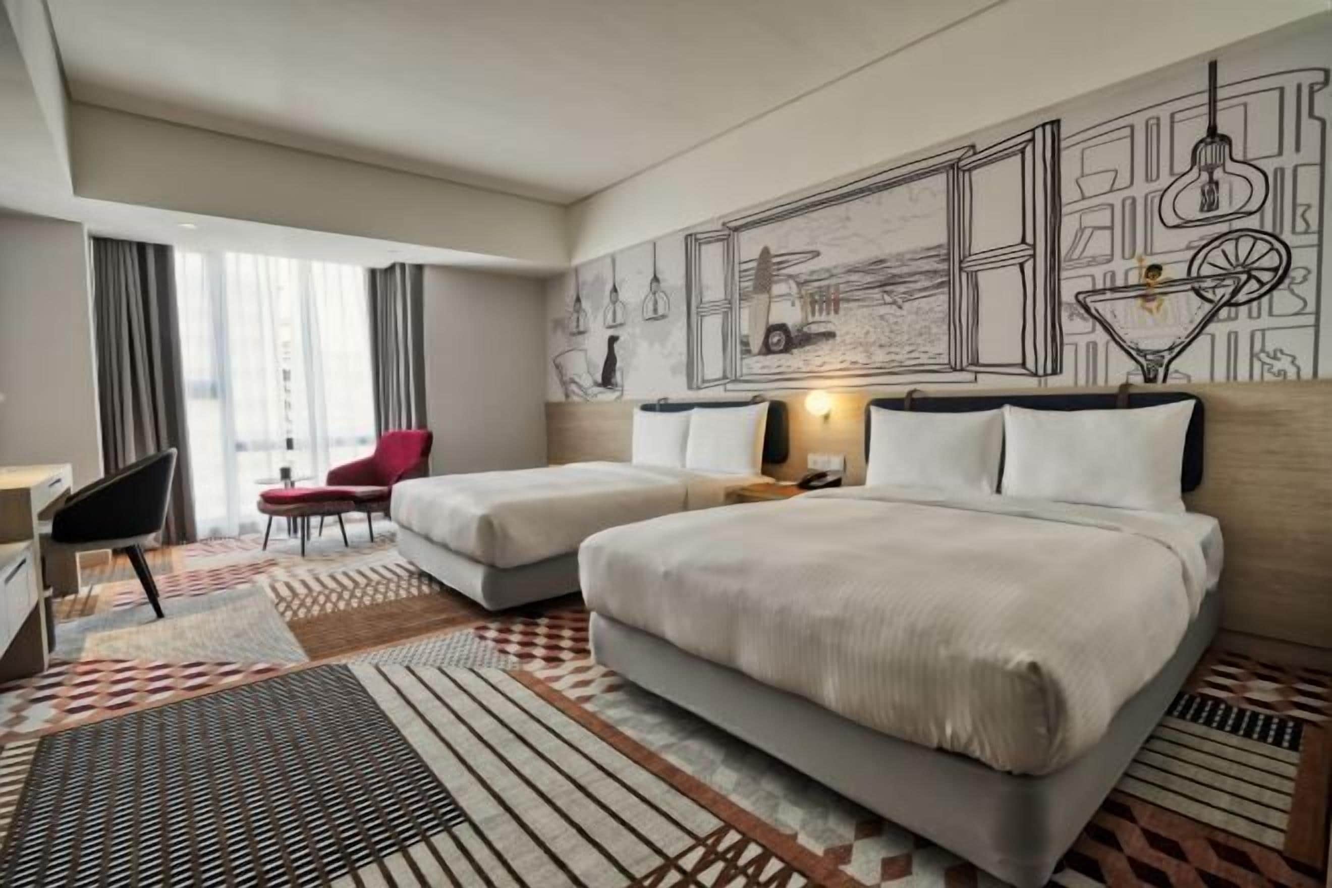 Down comforters, pillowtop beds, in-room safe, blackout drapes