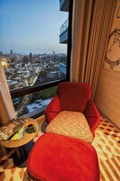 Down comforters, pillowtop beds, in-room safe, blackout drapes