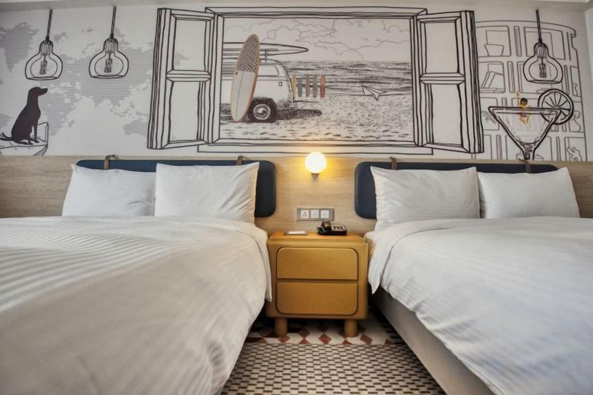 Down duvets, pillow-top beds, in-room safe, blackout curtains