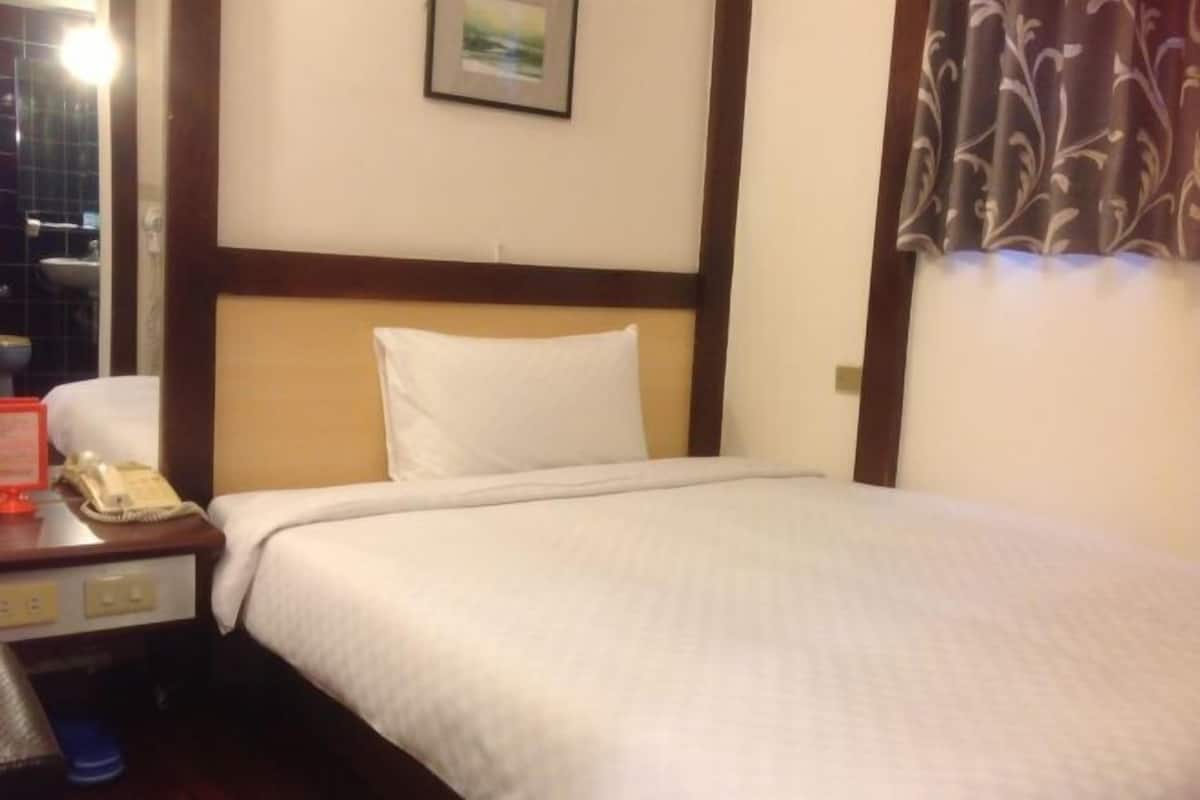 Desk, blackout drapes, WiFi (free), bed sheets