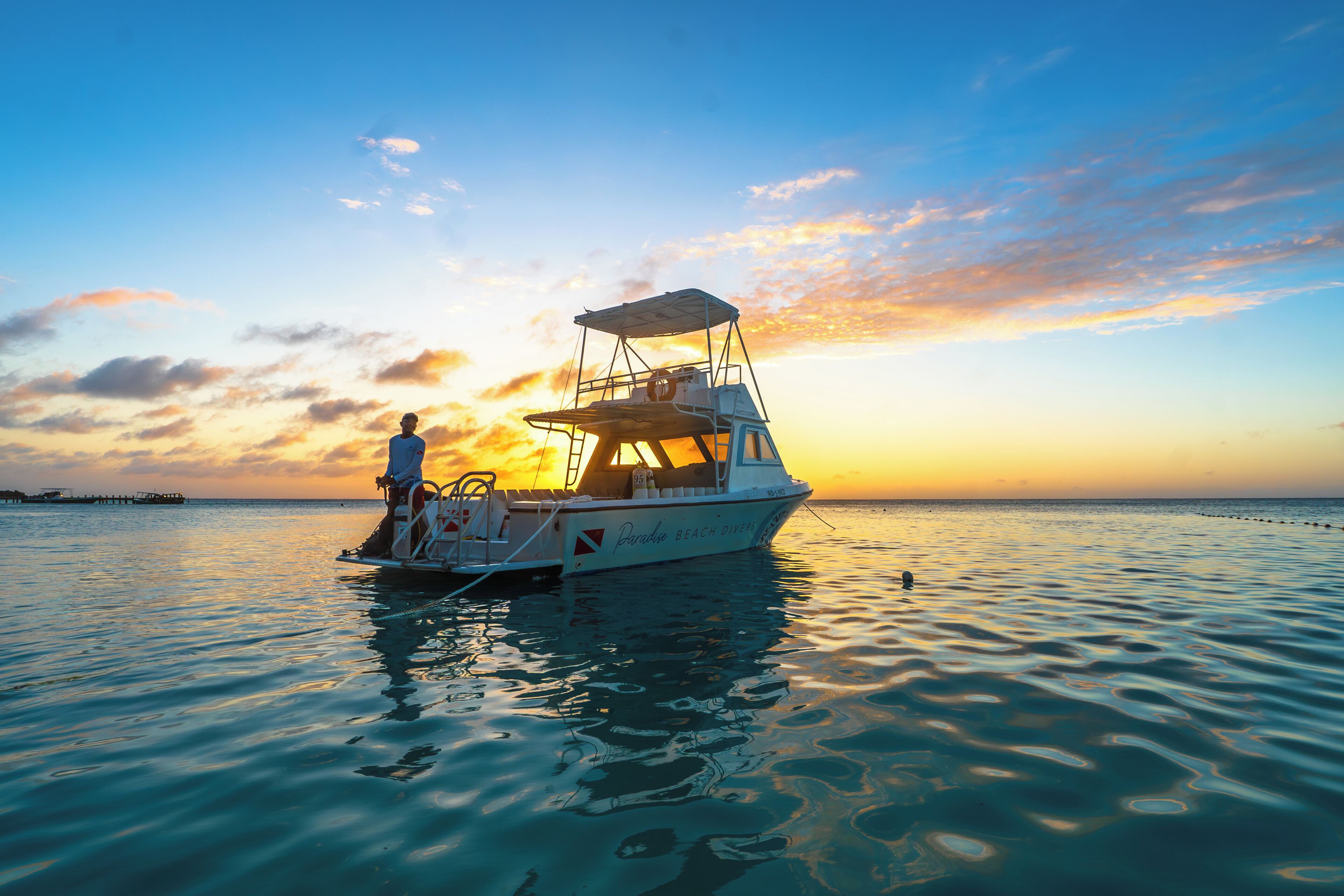 on the beach, white sand, free beach cabanas, sun-loungers