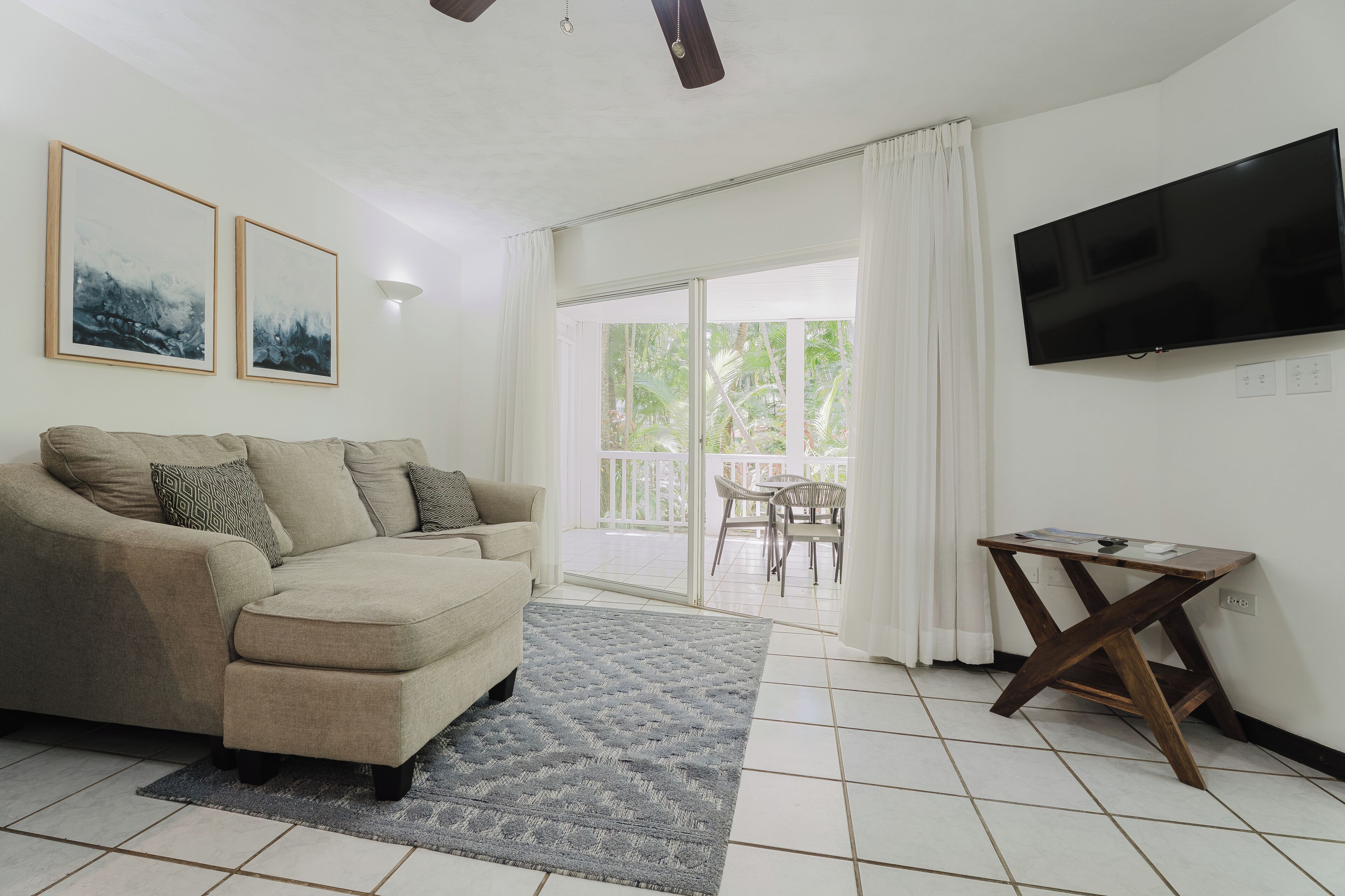 balcony condo one king room | living area | 32-inch tv with cable channels