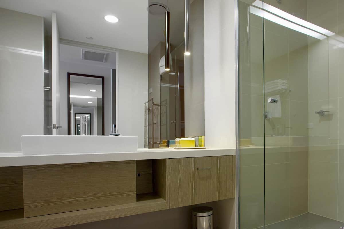 Shower, rainfall showerhead, designer toiletries, hair dryer