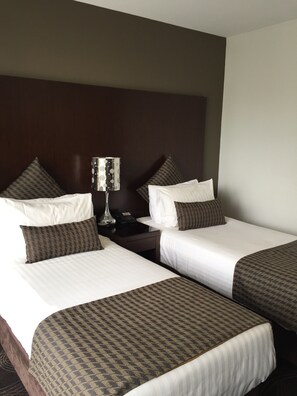 Premium bedding, pillow-top beds, in-room safe, desk