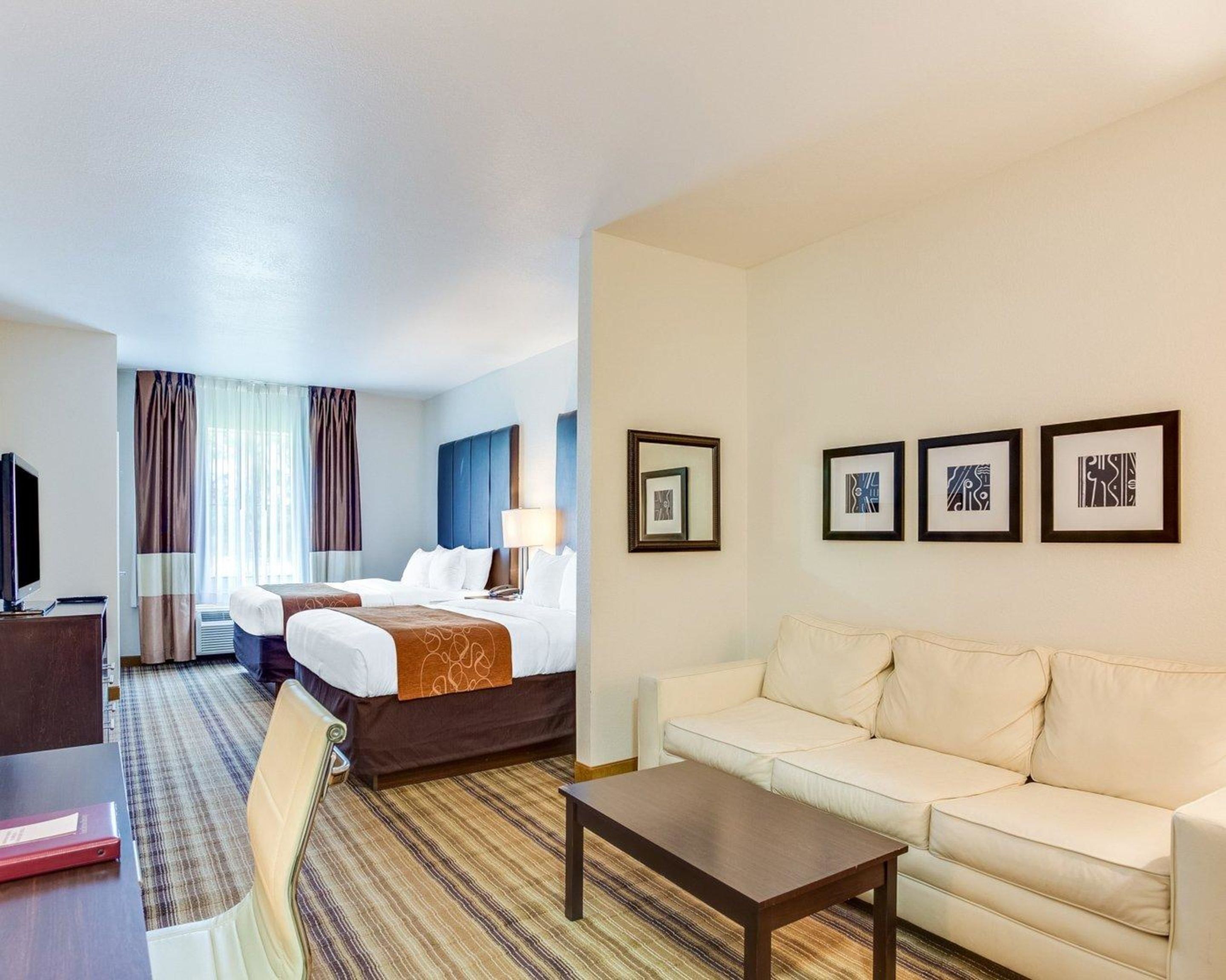 Premium bedding, down comforters, desk, laptop workspace