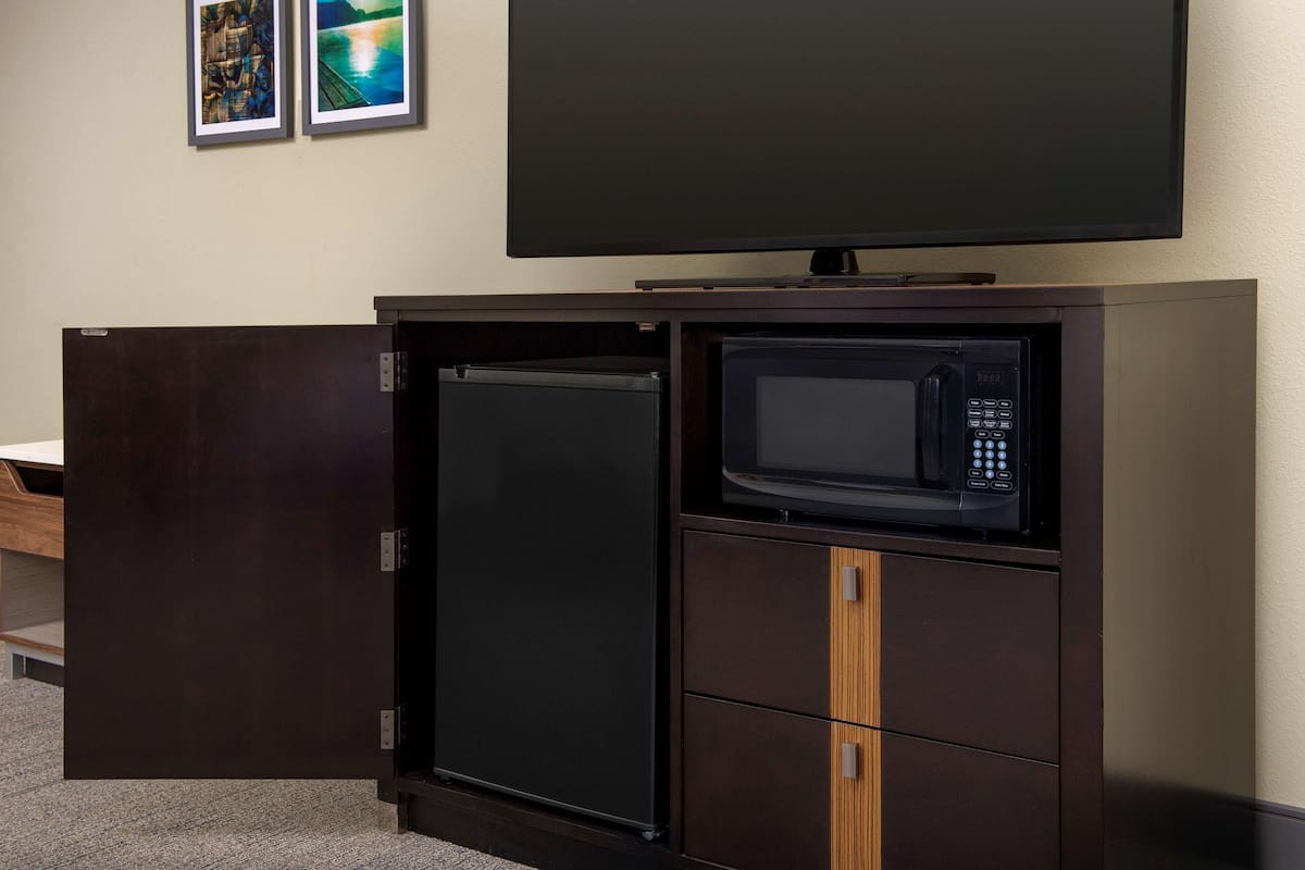 premium bedding, desk, blackout curtains, iron/ironing board