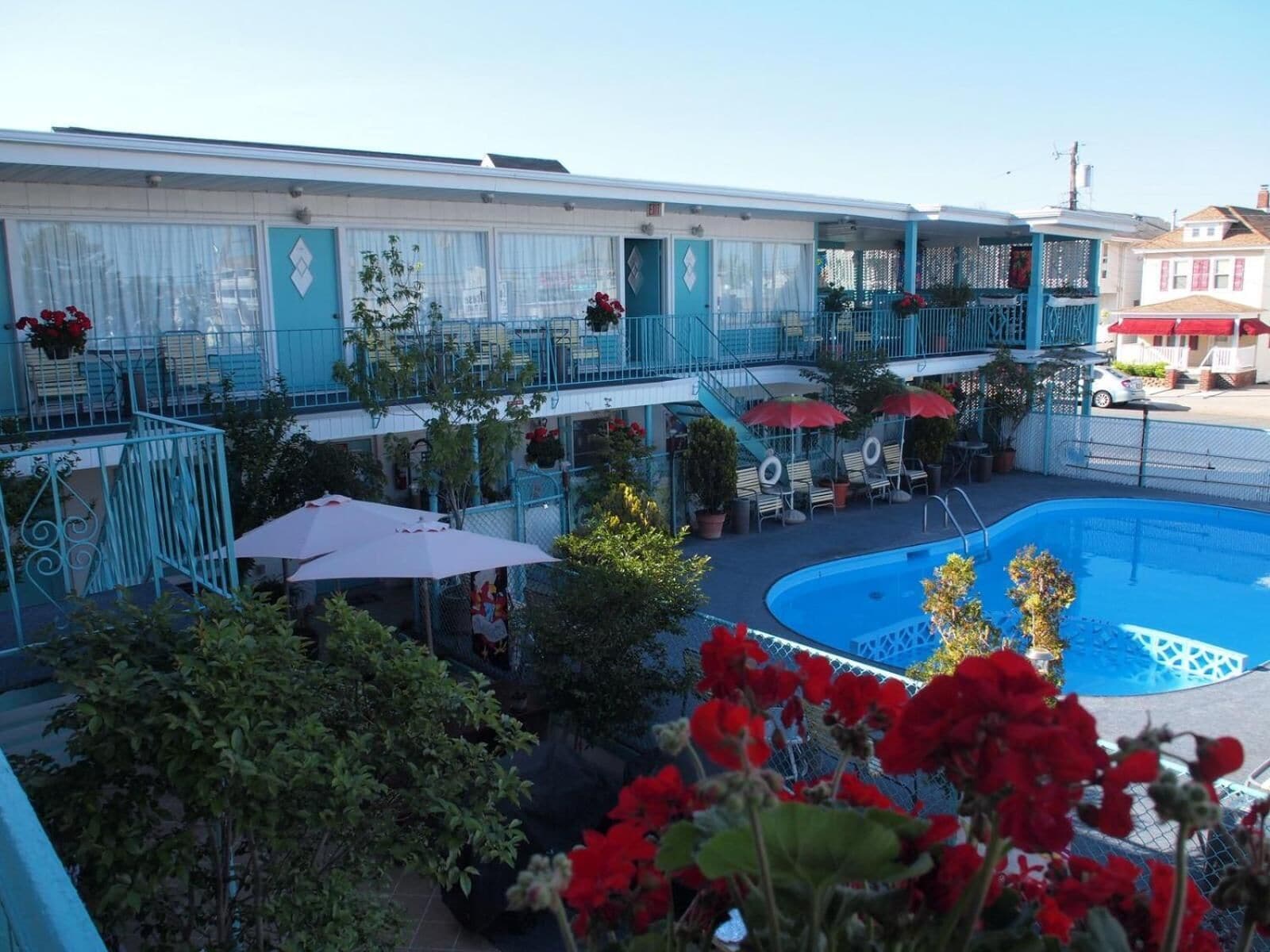 Seasonal outdoor pool, open 10:30 AM to 8 PM, pool umbrellas