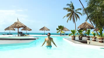 Outdoor pool, pool umbrellas, sun loungers