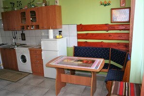 Family Apartment | Private kitchenette | Full-size fridge, stovetop, coffee/tea maker, cookware/dishes/utensils - Apartamenty Komfort (Augustow)
