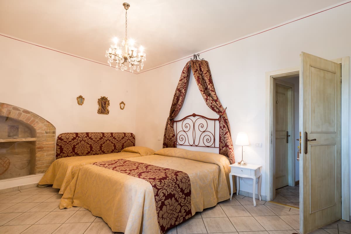 Down duvets, Select Comfort beds, in-room safe, desk