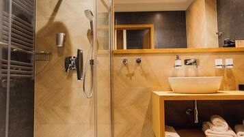 Shower, free toiletries, hair dryer, towels