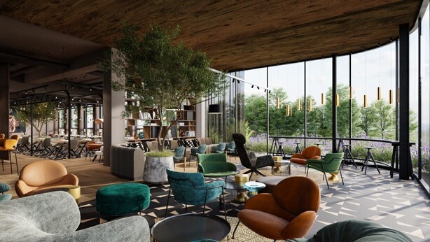 A modern lounge area with comfortable seating, a large bookshelf, and a view of greenery through large windows. - Hotel Euro (Pardubice)