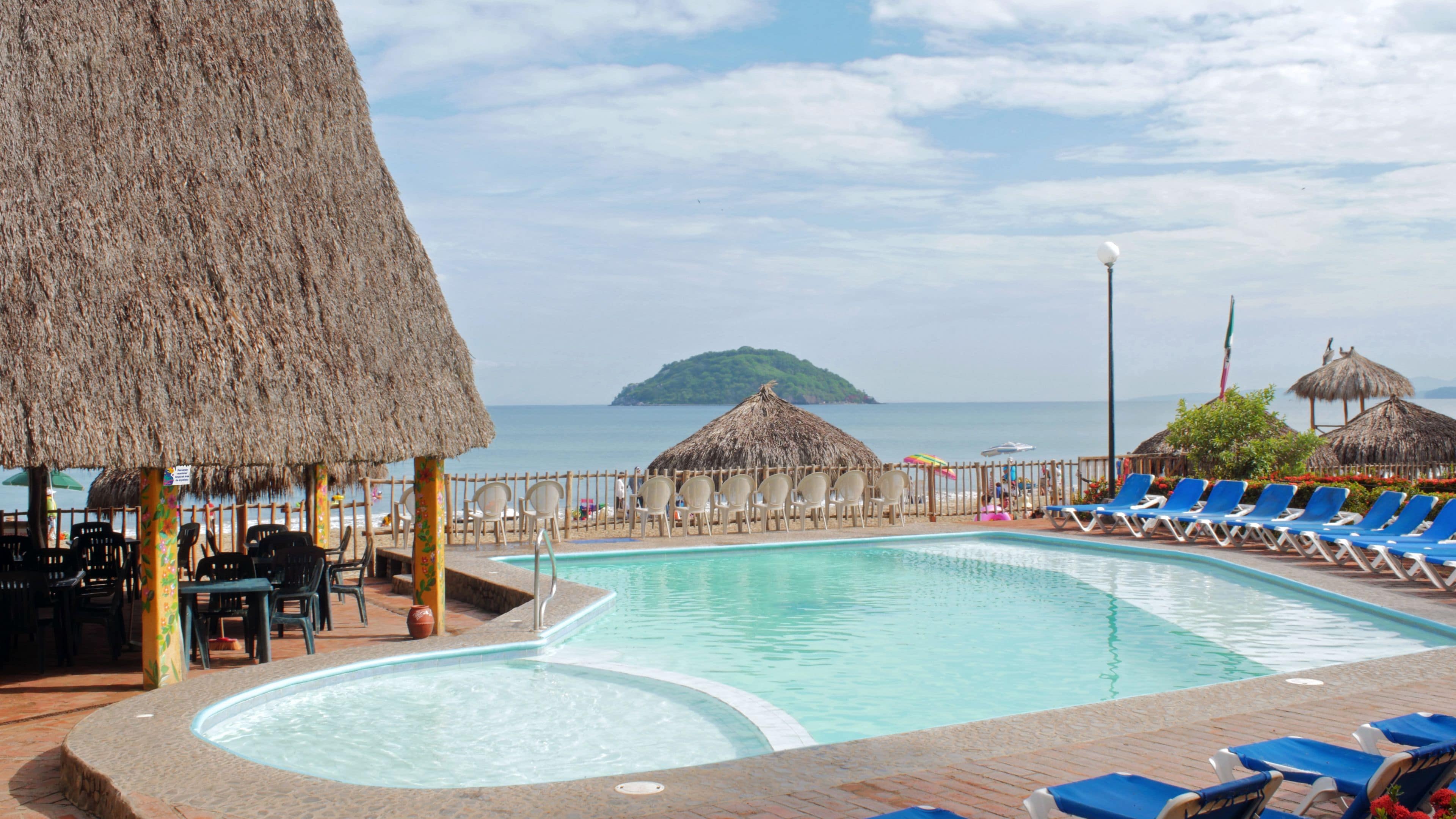 2 outdoor pools, open 9 AM to 8 PM, pool umbrellas, sun loungers