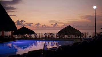 2 outdoor pools, open 9 AM to 8 PM, pool umbrellas, sun loungers