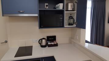 Family Apartment, Multiple Beds | In-room dining