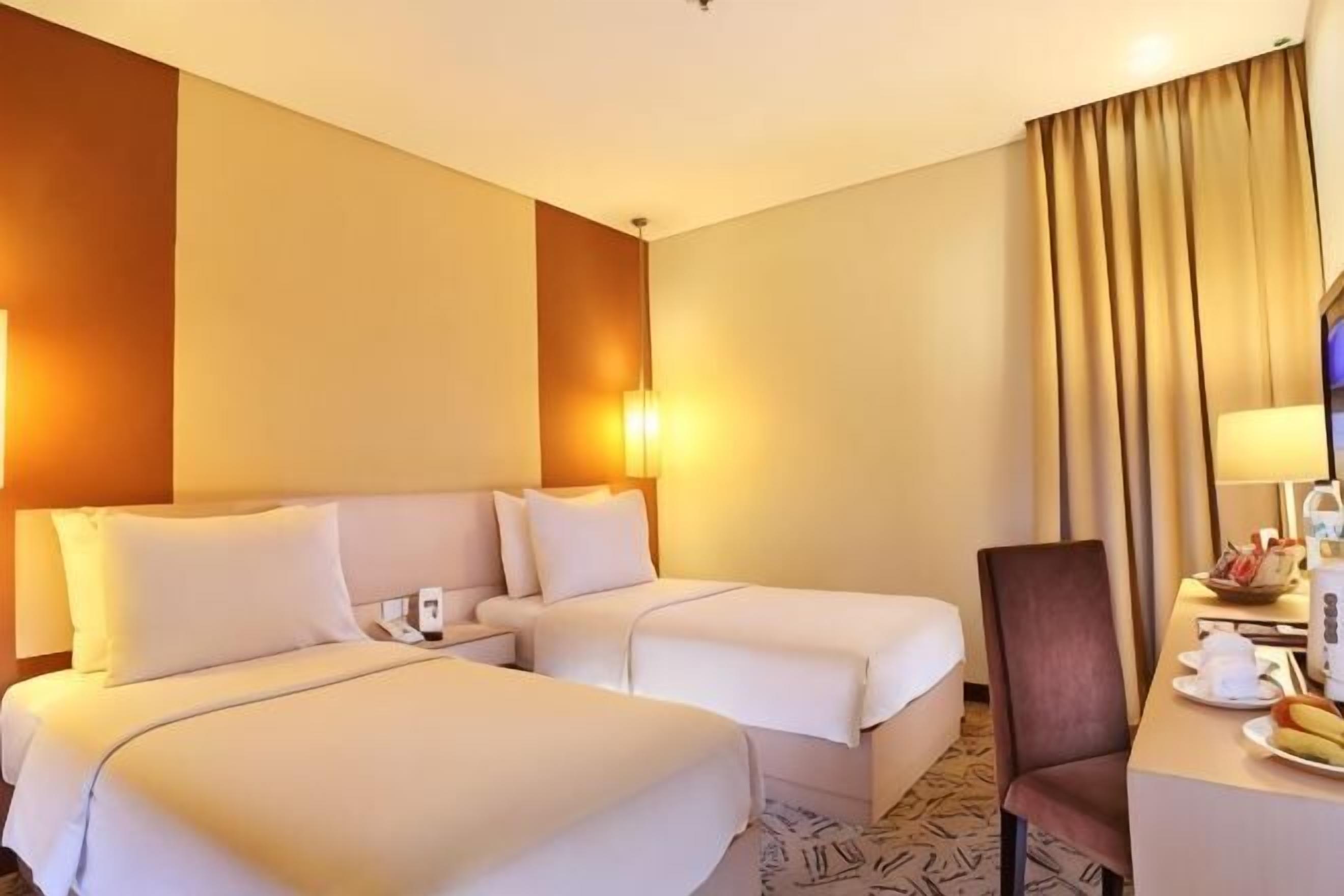 Ropa de cama de alta calidad y minibar 