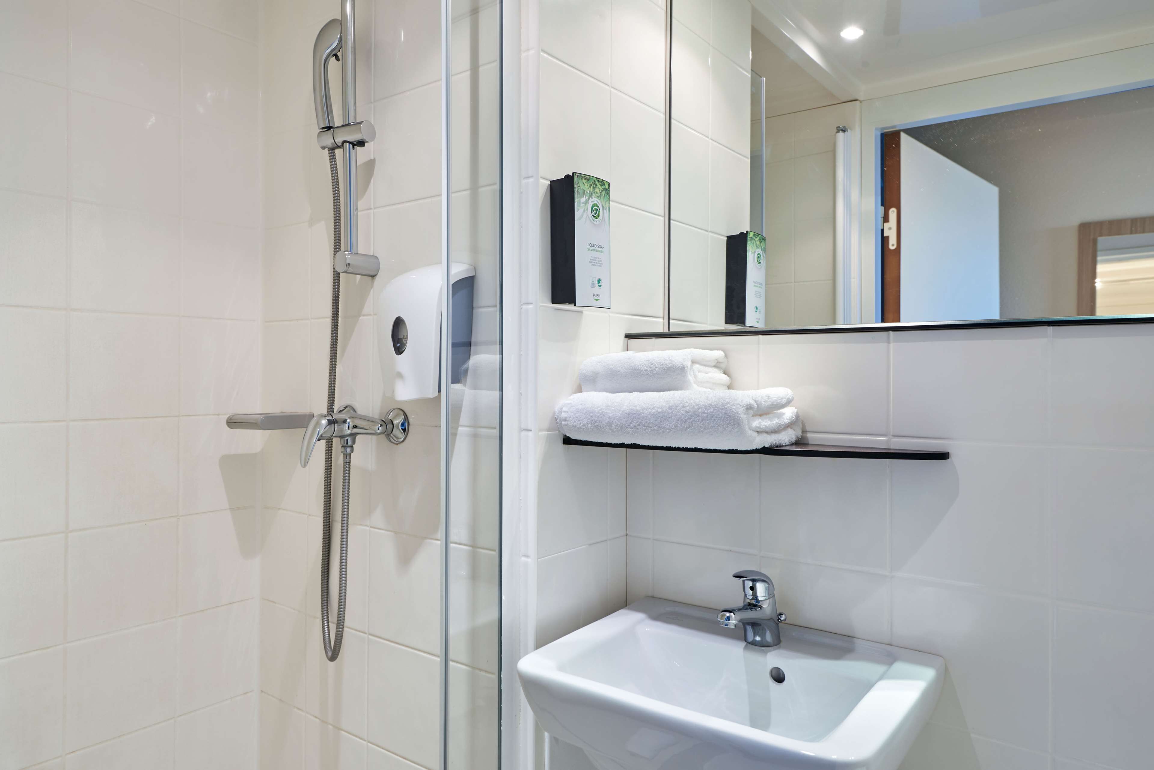 shower, eco-friendly toiletries, towels