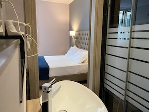 Desk, blackout curtains, free WiFi, bed sheets