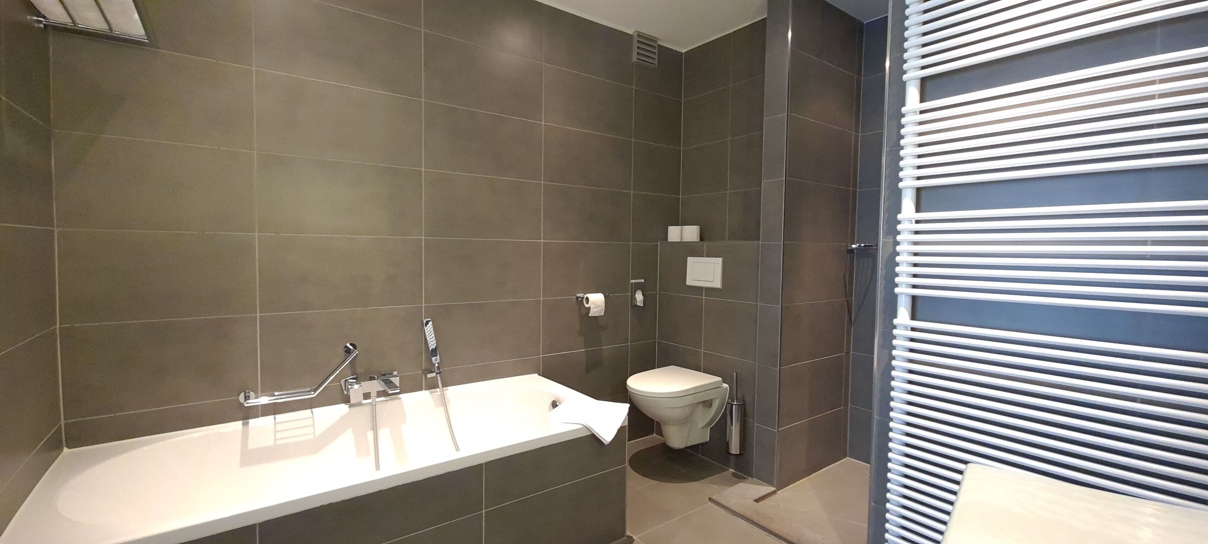 premium twin room, partial ocean view | 1 bedroom, minibar, in-room safe, desk