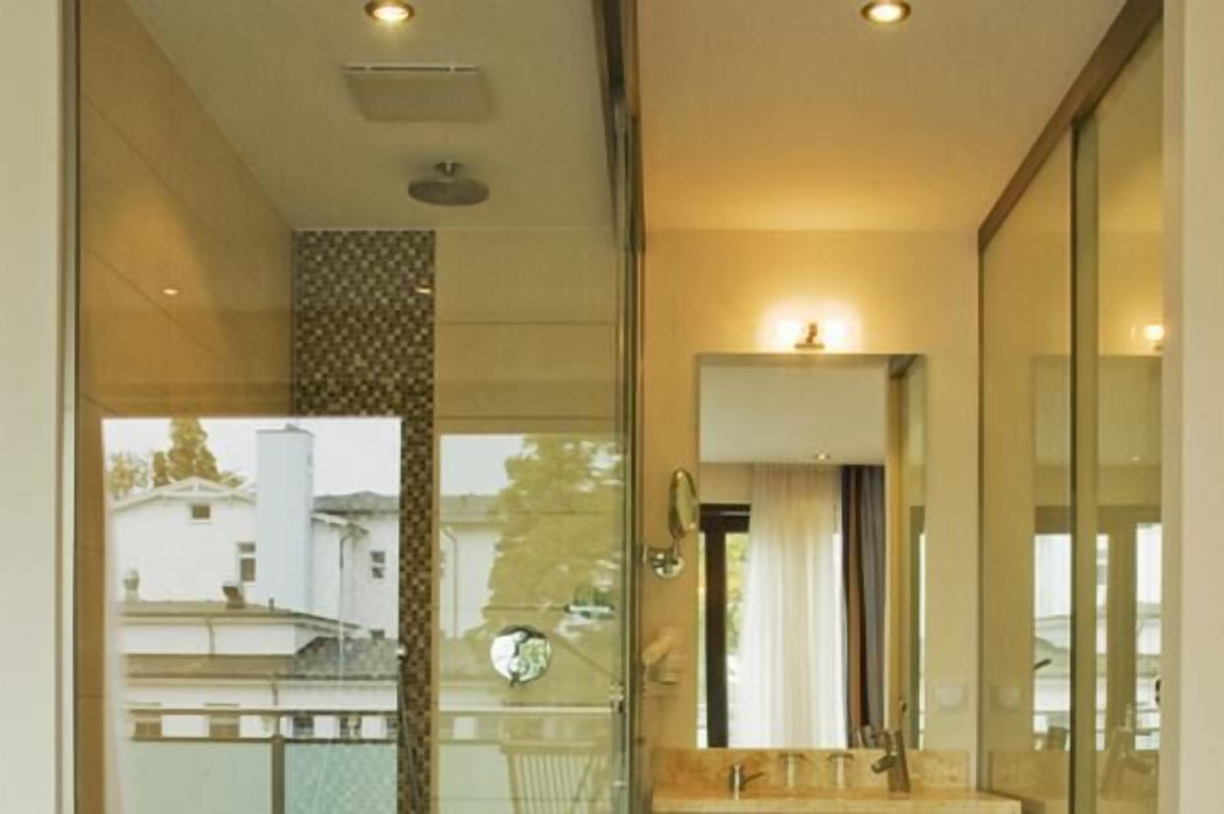 shower, hair dryer, bathrobes, towels