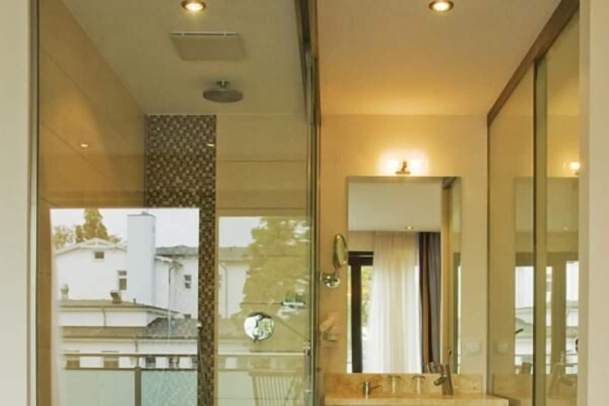 shower, hair dryer, bathrobes, towels