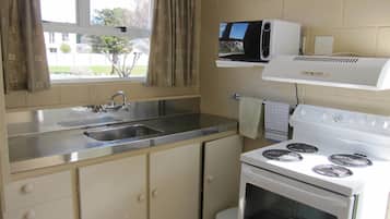 Family Room | Private kitchen | Fridge, microwave, coffee/tea maker, electric kettle