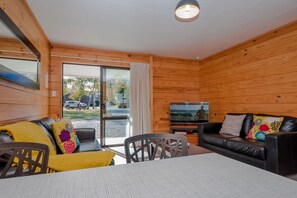 Motel 2 Bedroom | Living area | TV