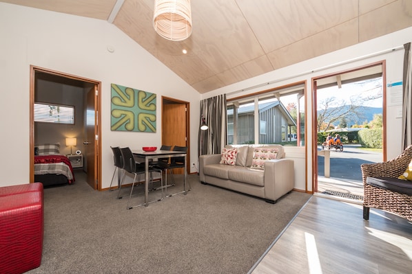 Self Contained - Sleeps 6 (2 Bedroom) | Living area | TV